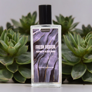 A perfume named "Fresh Fusion " is placed on the table with the background of Greenery