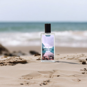 A Perfume named "Ocean Mist " is placed on Sand at the beach with the background of the sea